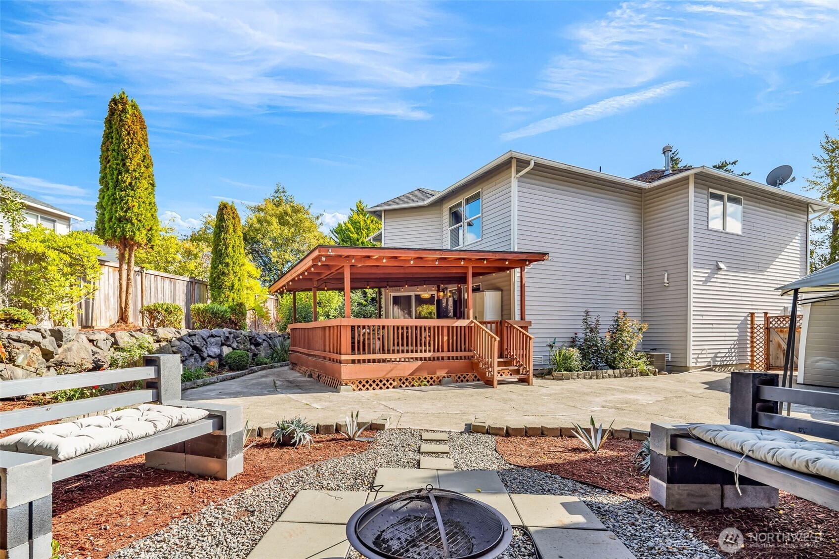 12830 Southeast 299th Street Auburn, WA 98092 - Photo 22 of 30 a front view of a house with a yard