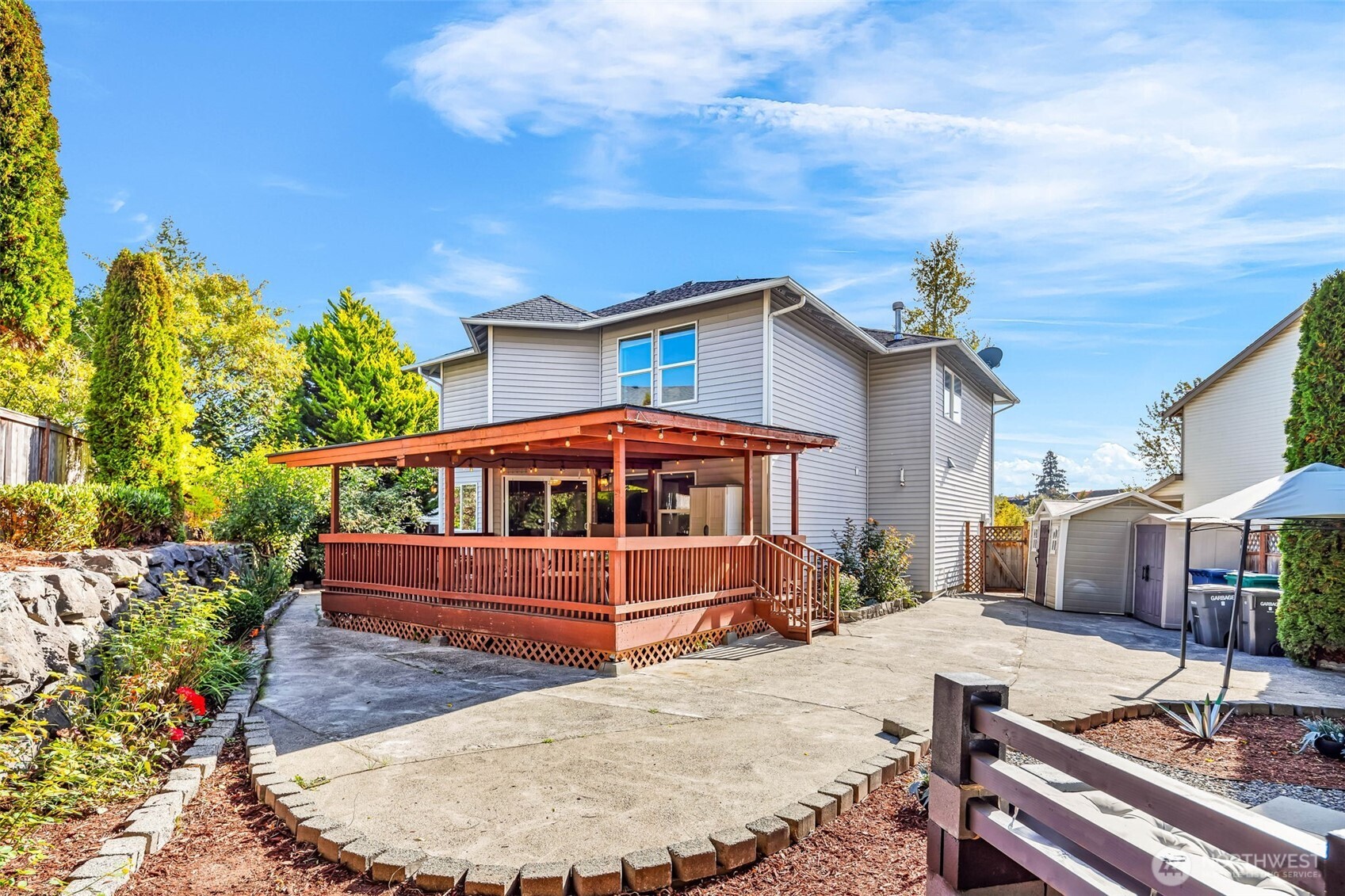 12830 Southeast 299th Street Auburn, WA 98092 - Photo 23 of 30 a front view of a house with a yard