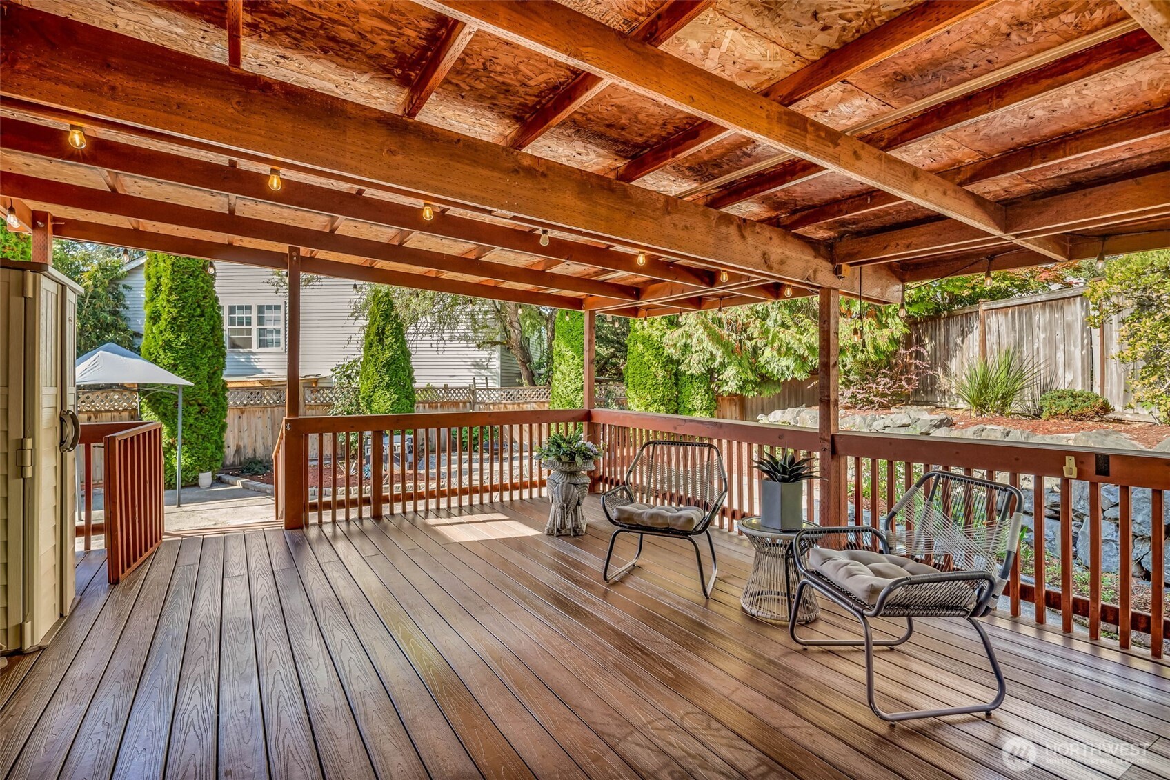 12830 Southeast 299th Street Auburn, WA 98092 - Photo 25 of 30 a porch with wooden floor in outdoor space