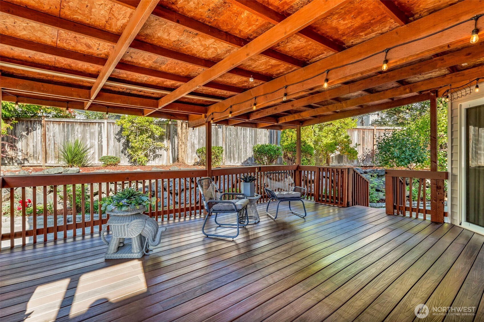 12830 Southeast 299th Street Auburn, WA 98092 - Photo 26 of 30 a view of a swimming pool with outdoor seating