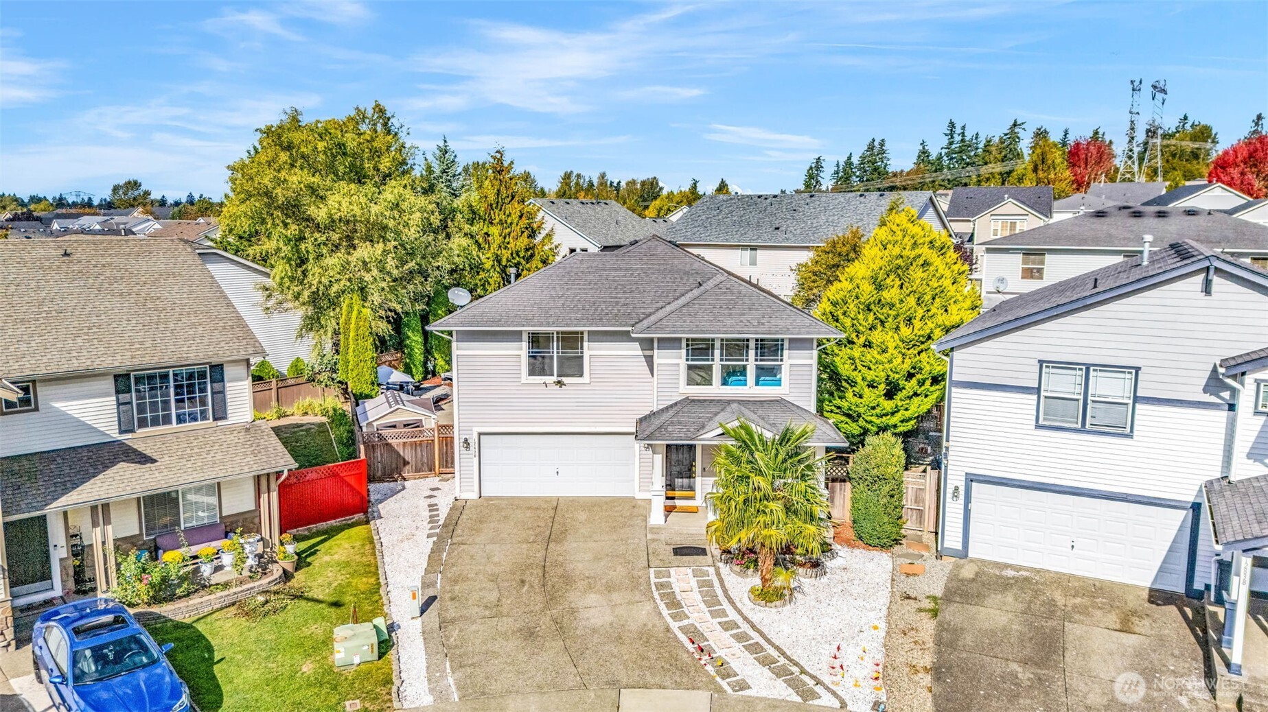 12830 Southeast 299th Street Auburn, WA 98092 - Photo 29 of 30 a front view of a house with a garden