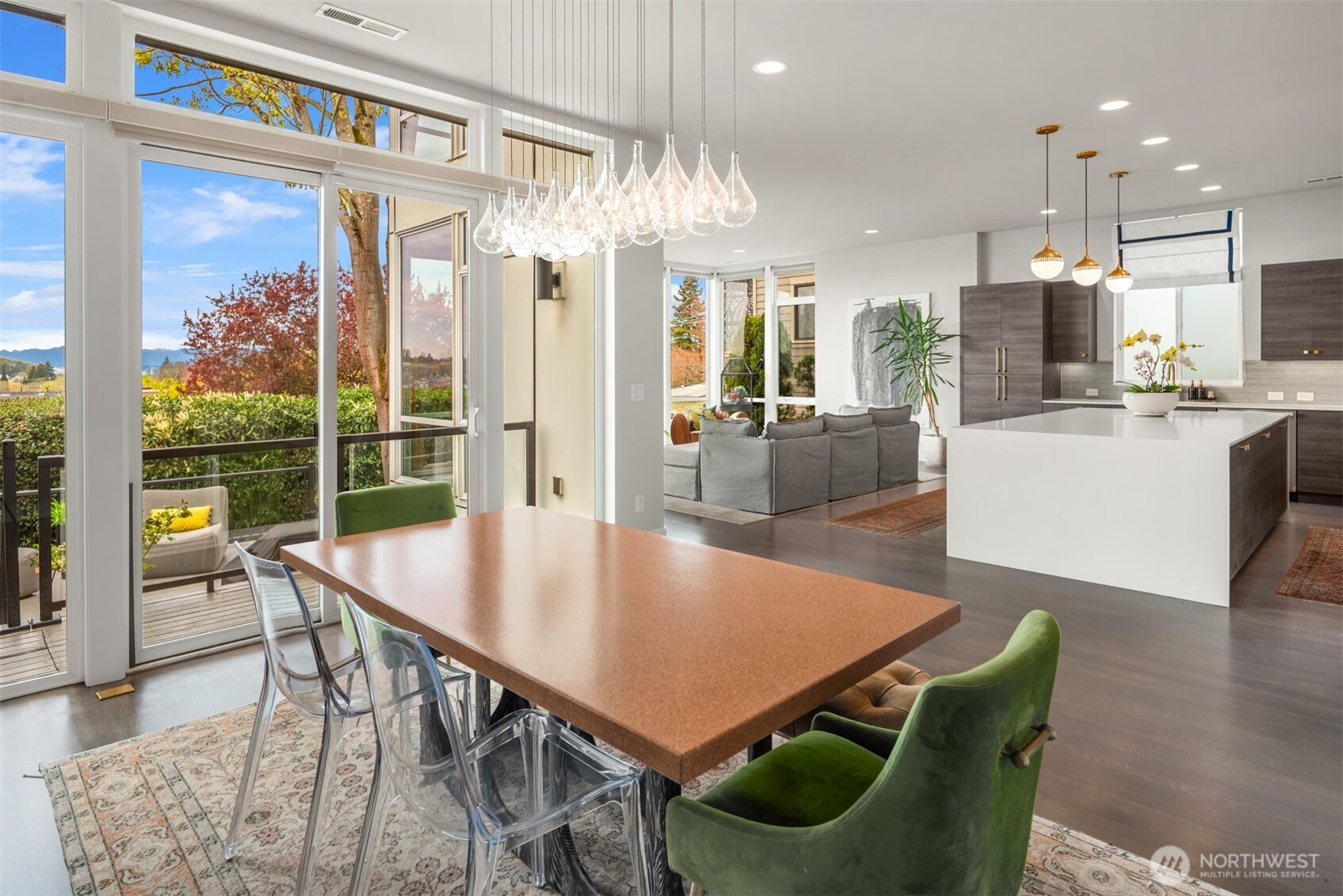 1115 30th Avenue South Seattle, WA 98144 - Photo 11 of 37 a dining room with furniture a chandelier and wooden floor