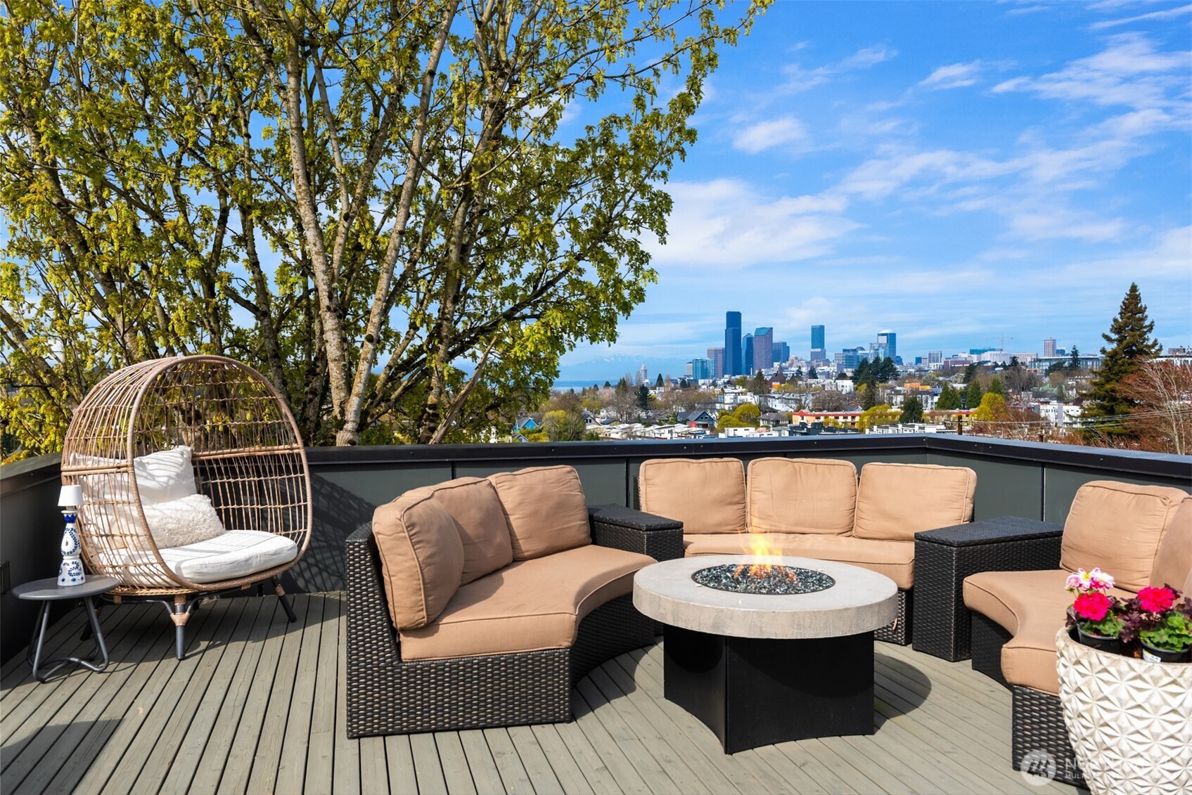 1115 30th Avenue South Seattle, WA 98144 - Photo 29 of 37 a balcony with couple of couches and potted plants