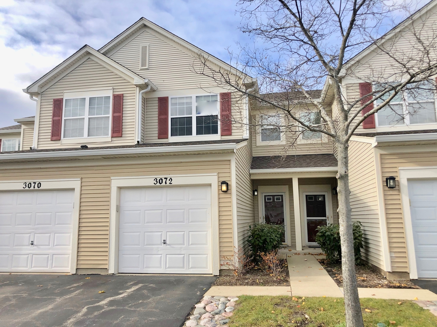 3072 Falling Waters Lane Lindenhurst, IL 60046 - Photo 1 of 27 a view of a house with a large windows and a large tree