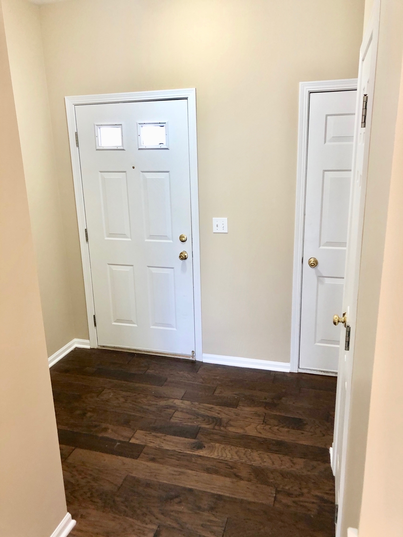 3072 Falling Waters Lane Lindenhurst, IL 60046 - Photo 14 of 27 a view of room with window and wooden floor