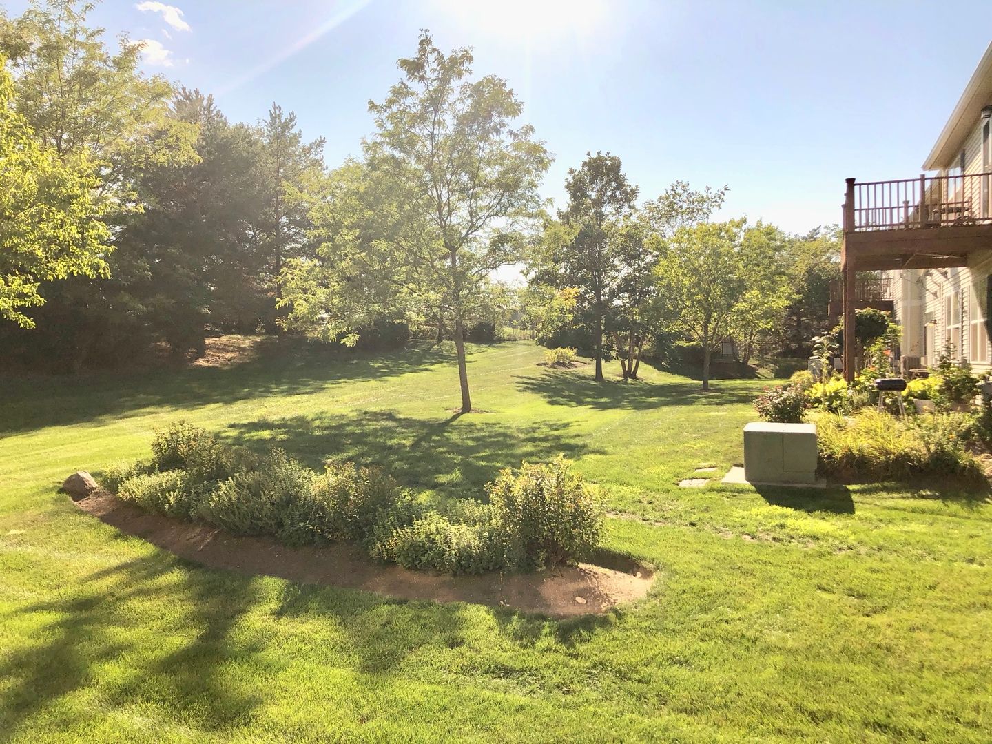 3072 Falling Waters Lane Lindenhurst, IL 60046 - Photo 19 of 27 a swimming pool with some trees in the background