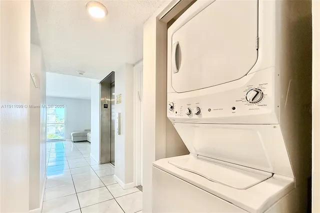 a bathroom with a toilet and a view of bathroom