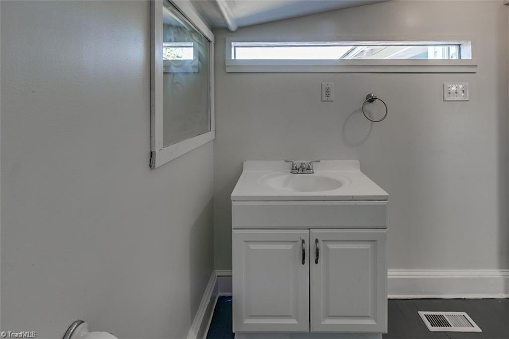 1423 Pleasant Ridge Road Ramseur, NC 27316 - Photo 19 of 30 Second bathroom off mudroom.