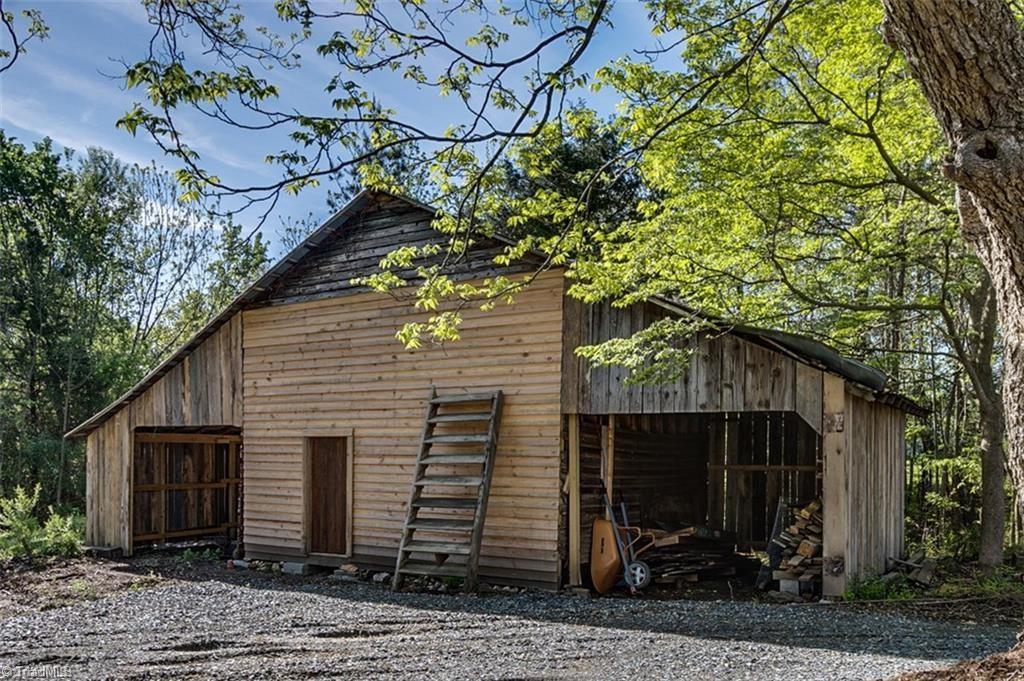 1423 Pleasant Ridge Road Ramseur, NC 27316 - Photo 21 of 30 Original barn with new exterior wood