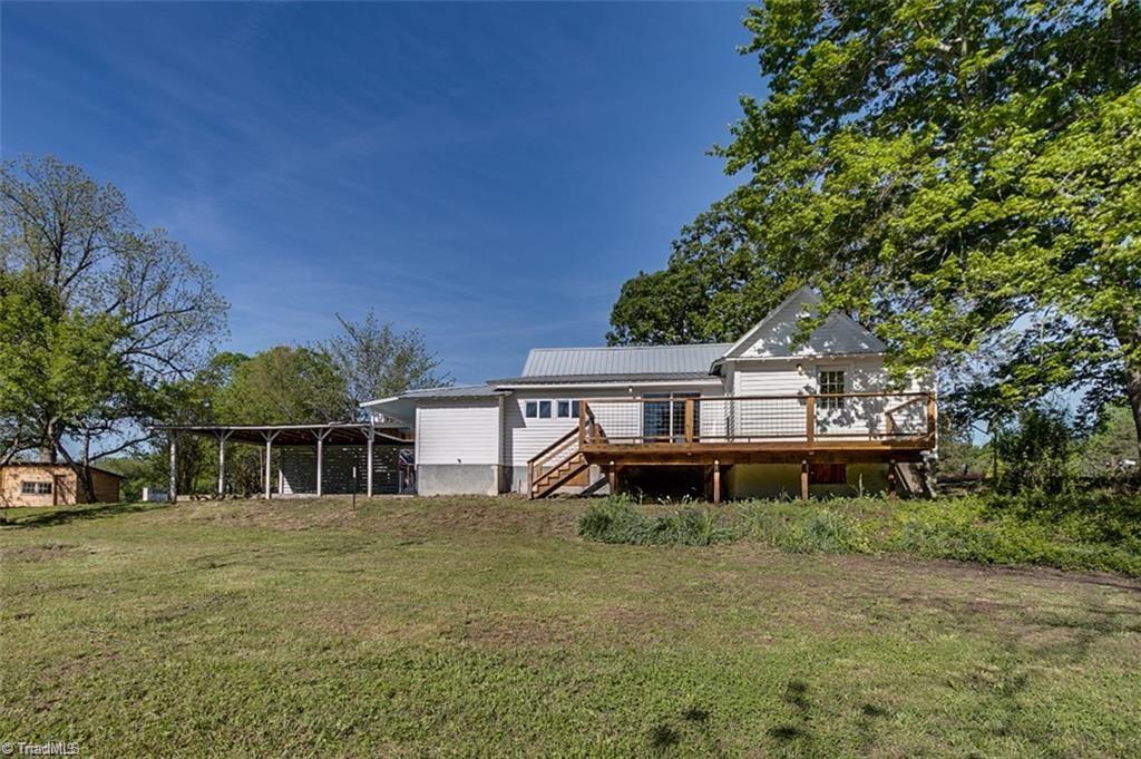 1423 Pleasant Ridge Road Ramseur, NC 27316 - Photo 24 of 30 Mature trees and rolling hills right outside the door!