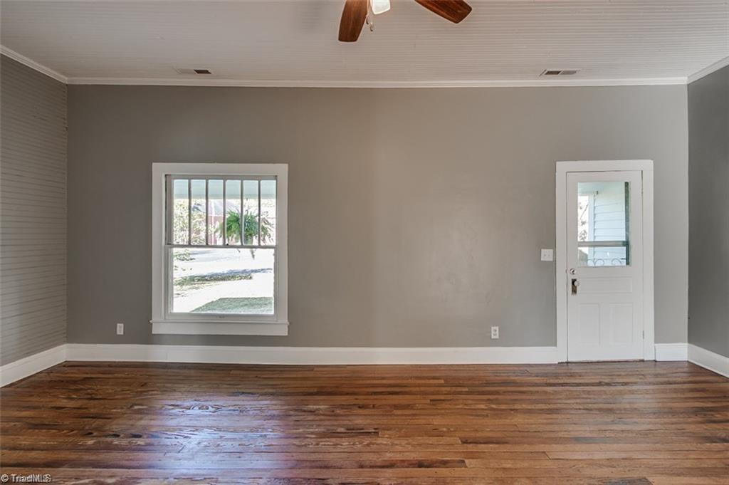Living room leading out to front porch 