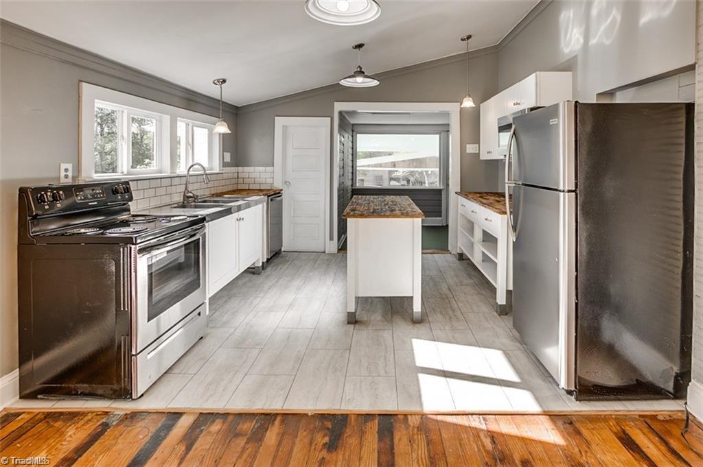 Remodeled kitchen with butchers block island