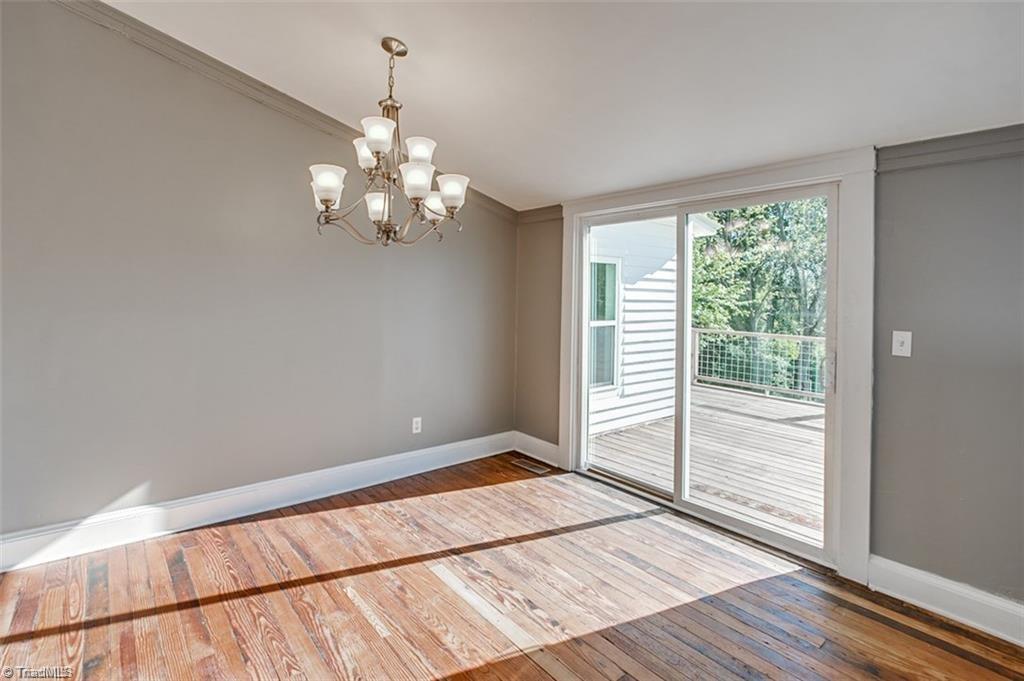 1423 Pleasant Ridge Road Ramseur, NC 27316 - Photo 10 of 30 Dining room leading to back porch