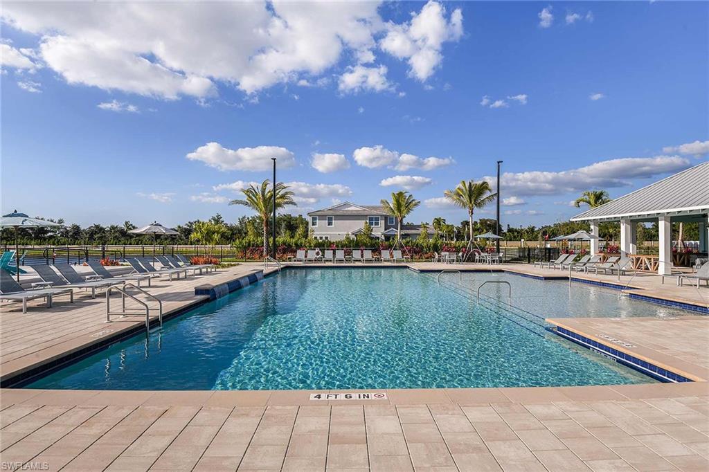 4676 Arboretum Circle, Unit 102 Naples, FL 34112 - Photo 6 of 35 a view of a lake