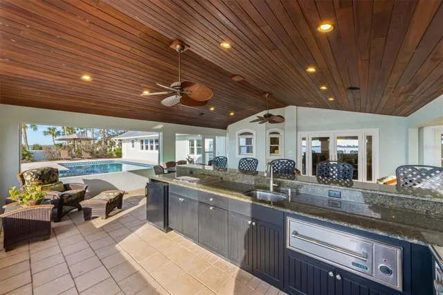 a kitchen with lots of counter top space and a window