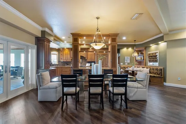 a view of an entryway with wooden floor and a window