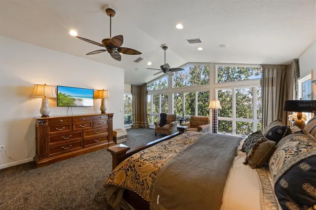 an outdoor space with pool and furniture