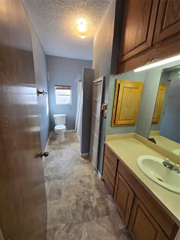 a view of empty room with front door