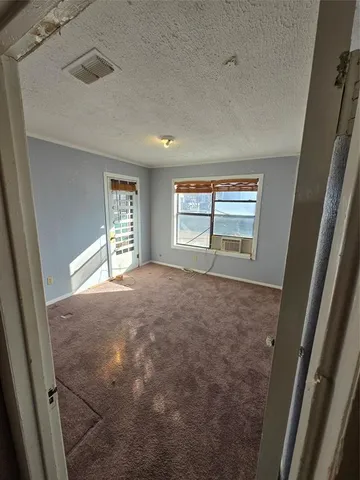 a view of storage and utility room
