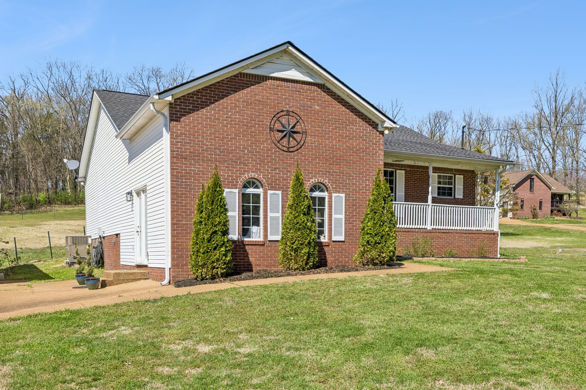 1245 Cliff Amos Road Spring Hill, TN 37174 - Photo 3 of 41 a front view of house with yard and green space
