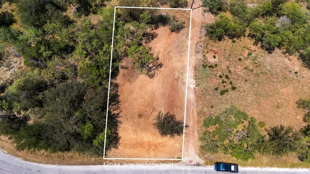 a view of yard covered with snow in outdoor space