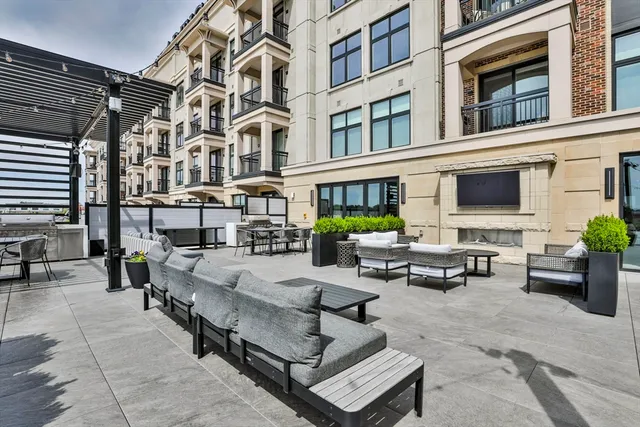 a building outdoor space with patio furniture