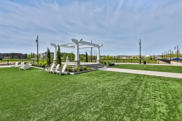 a view of a park with large trees