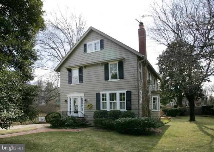 3602 Shepherd Street Chevy Chase, MD 20815 - Photo 1 of 12 a front view of a house with garden