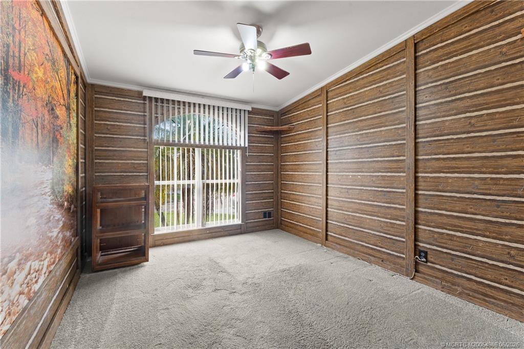 4237 4th Court Lantana, FL 33462 - Photo 17 of 40 a view of an empty room with a window