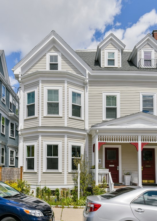 66 Wyman Street, Unit 1 Boston, MA 02130 - Photo 33 of 34 a front view of a building with street view