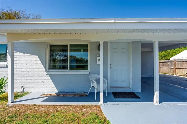 a front view of a house with a porch