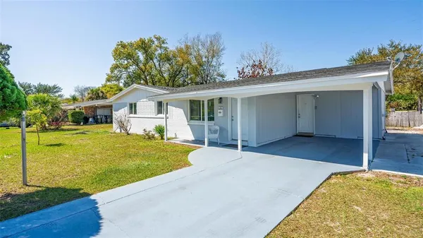 a view of house with outdoor space