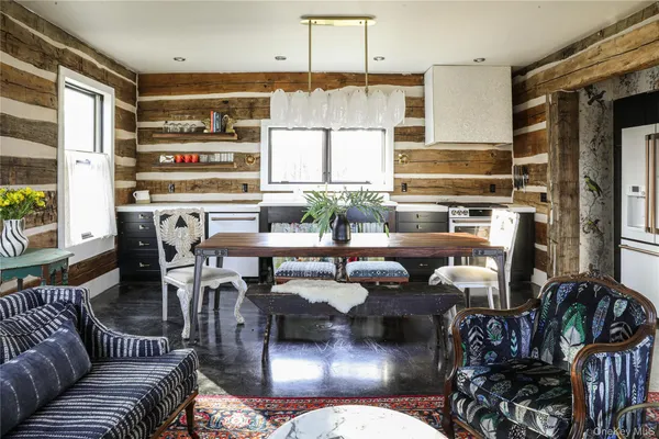 a bedroom with furniture and a window