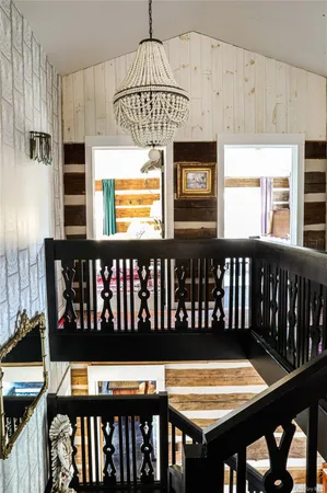a view of a balcony with wooden floor