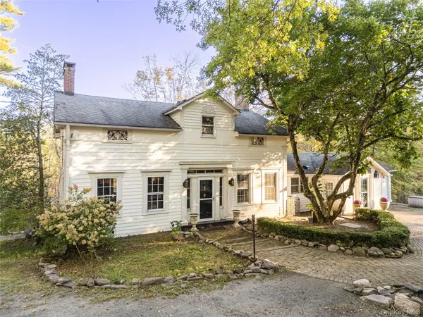 a front view of a house with balcony