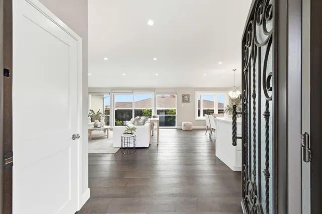 a view of swimming pool with outdoor seating and yard in back
