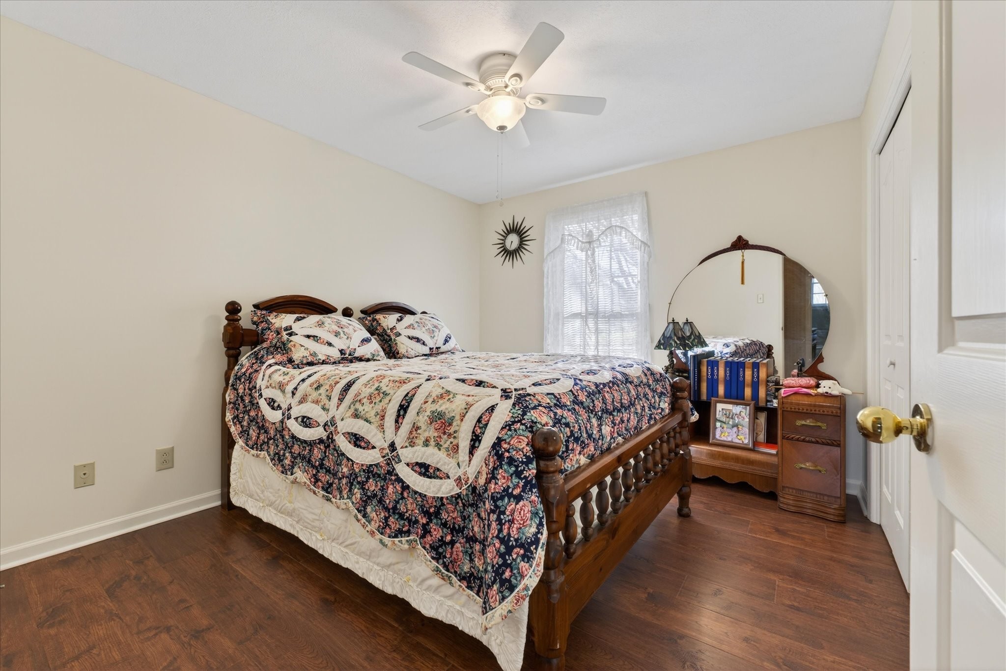 2201 Bearden Road Clarksville, TN 37043 - Photo 19 of 38 a bedroom with a bed and a chandelier