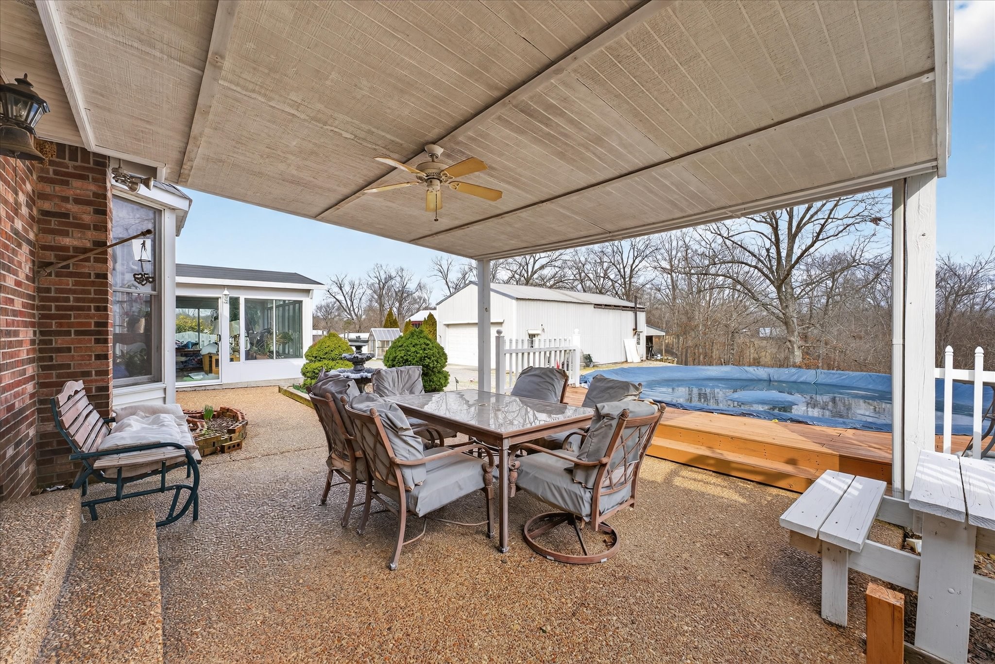 2201 Bearden Road Clarksville, TN 37043 - Photo 25 of 38 a view of a patio with table and chairs and potted plants