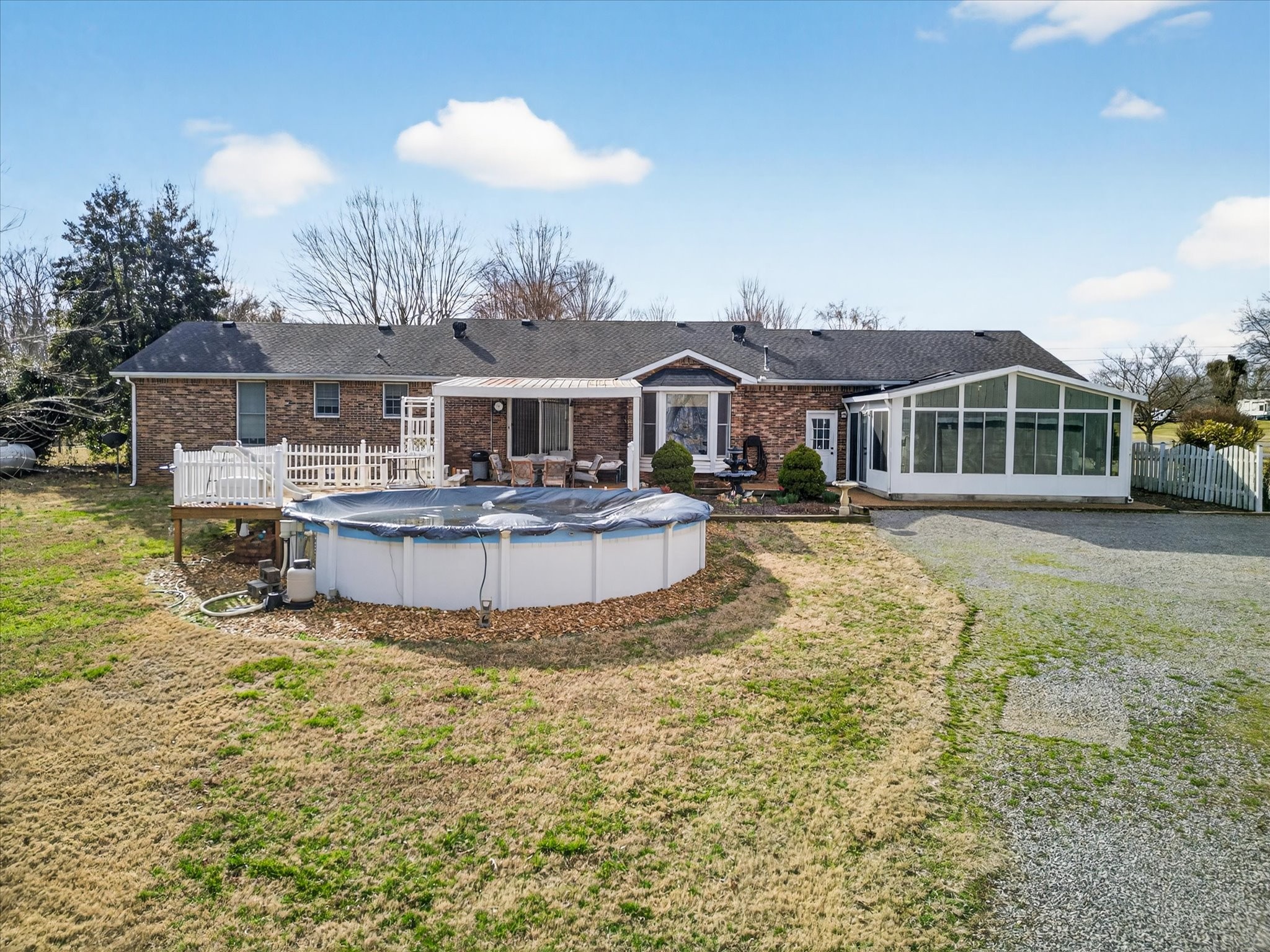 2201 Bearden Road Clarksville, TN 37043 - Photo 28 of 38 a view of a house with swimming pool and sitting area