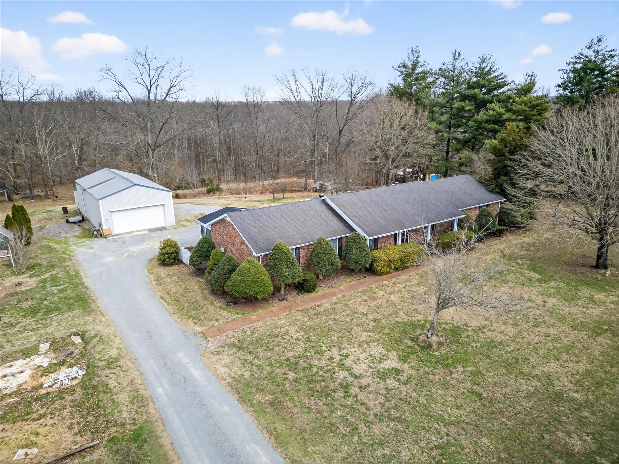 2201 Bearden Road Clarksville, TN 37043 - Photo 35 of 38 a view of a house with a yard and sitting area
