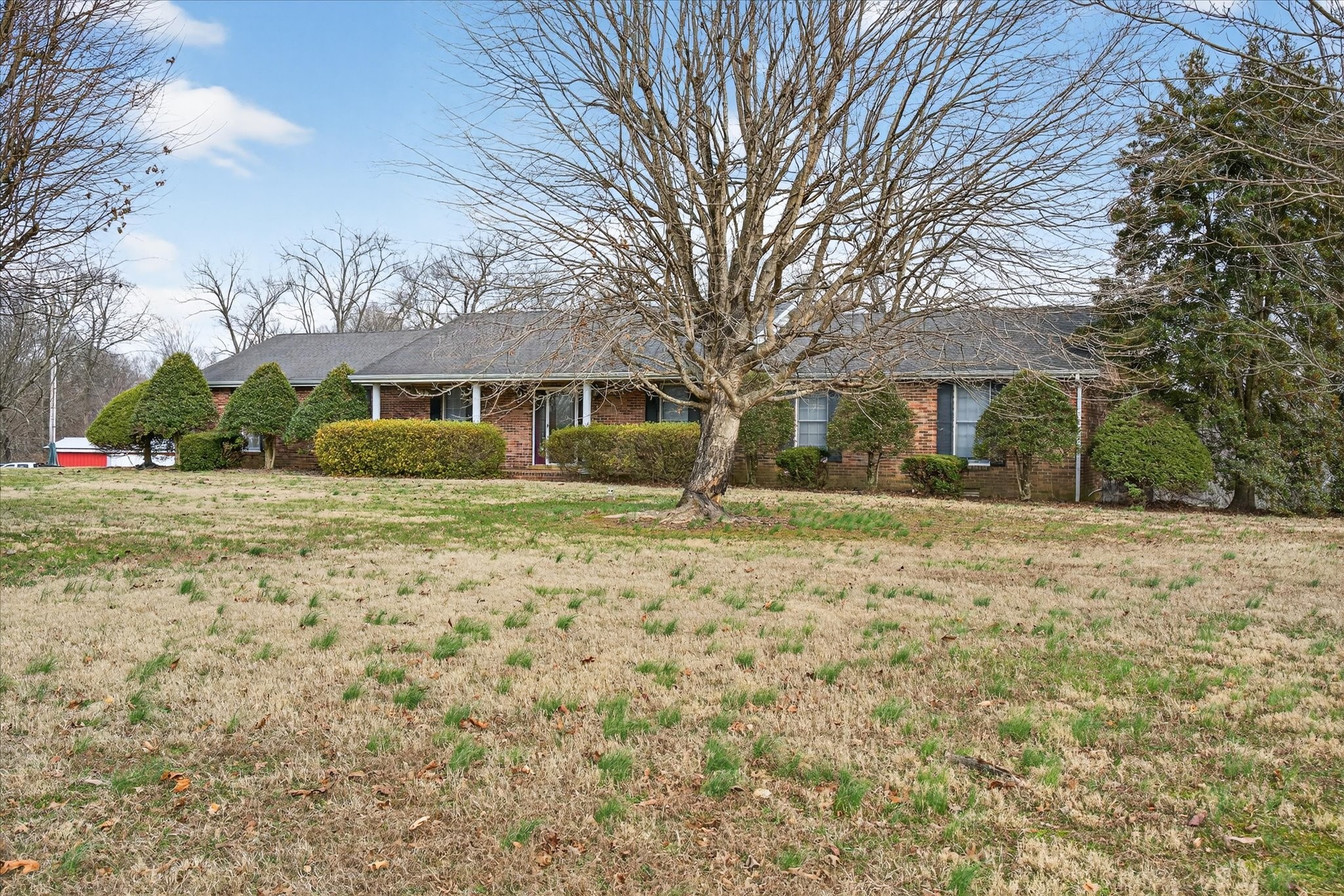 2201 Bearden Road Clarksville, TN 37043 - Photo 4 of 38 a front view of a house with a yard