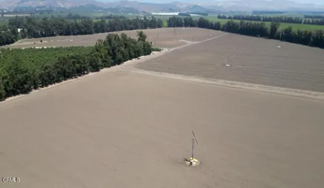 a view of a terrace with yard