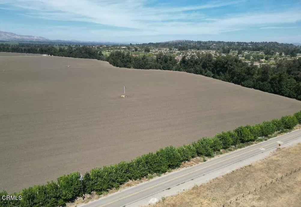 3425 Wright Road Camarillo, CA 93010 - Photo 7 of 15 an aerial view of a house with a garden and lake view