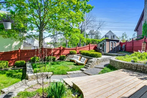 a view of front a house with a garden