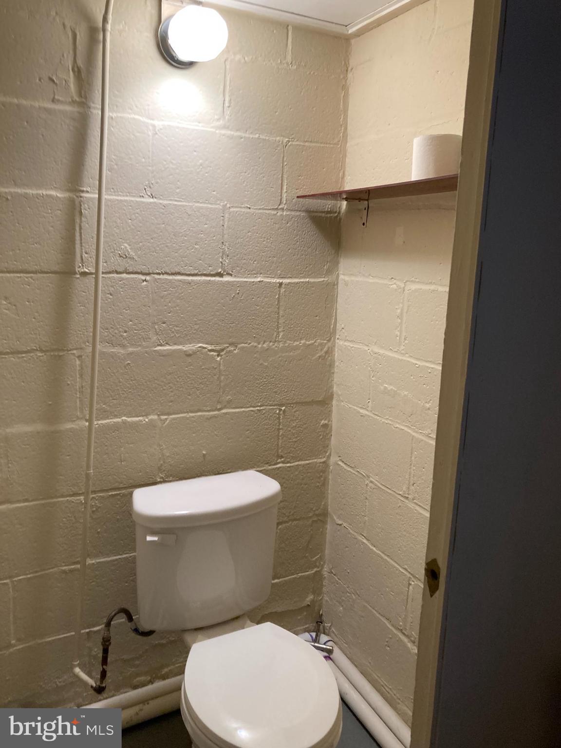 1927 Holborn Road Baltimore, MD 21222 - Photo 28 of 35 BASEMENT FLUSH ROOM