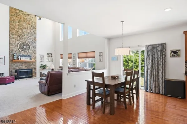 a spacious bedroom with a bed and a large window