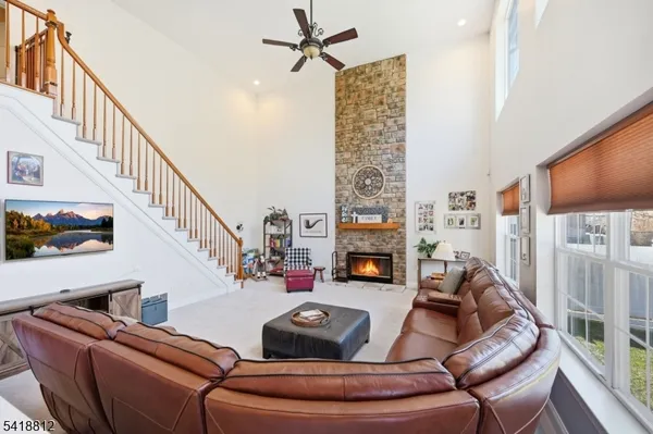a bed room with furniture and a window