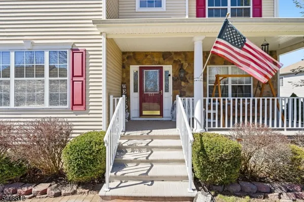 a front view of a house with a porch