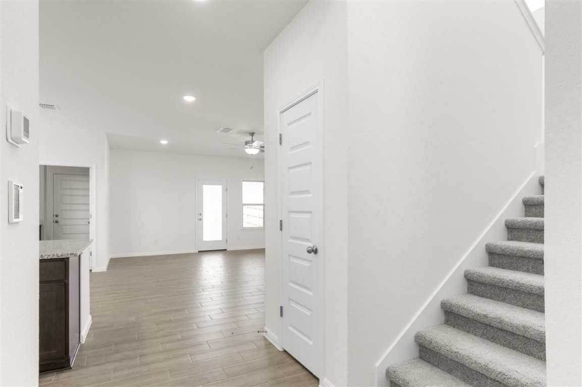 709 Paddock Lane Georgetown, TX 78626 - Photo 18 of 35 a view of an entryway with wooden floor