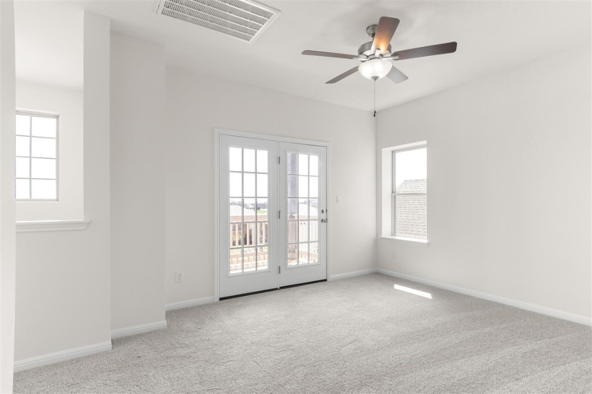 709 Paddock Lane Georgetown, TX 78626 - Photo 19 of 35 a view of an empty room with a window